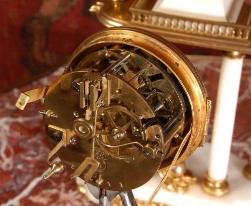 fig 4. Ormolu and White Marble Antique French Boudoir Portico Clock
by A. D. Mougin. 