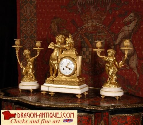 Fine Ormolu and White Marble Clock Set
by Vincenti
