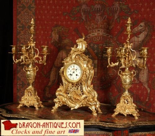 Stunning Antique French Rococo Clock Set
by Fritz Marti