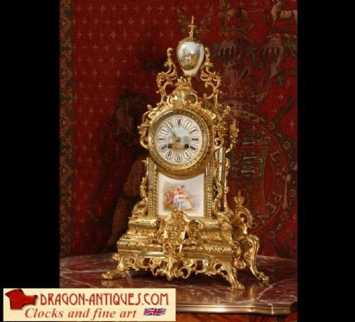 Large Sevres Porcelain & Gilt Brass Clock
by A. D. Mougin