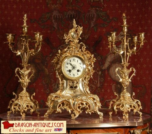 Antique French Gilt Brass Clock Set
by Louis Japy