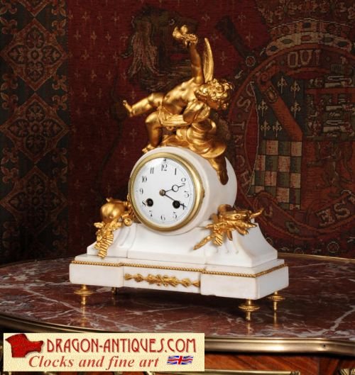 Stunning Antique French Boudoir Clock
cherub of Music