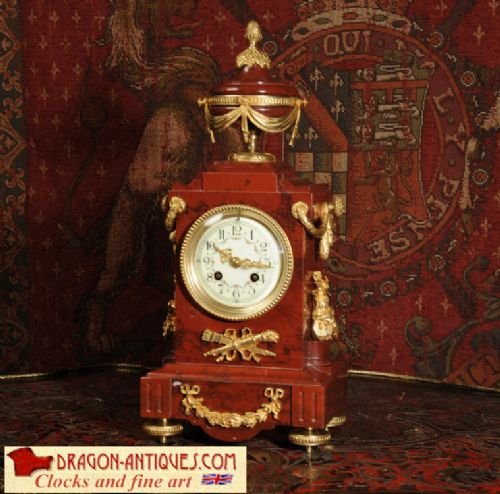 Stunning Red Marble and Ormolu Table Clock
a. D. Mougin