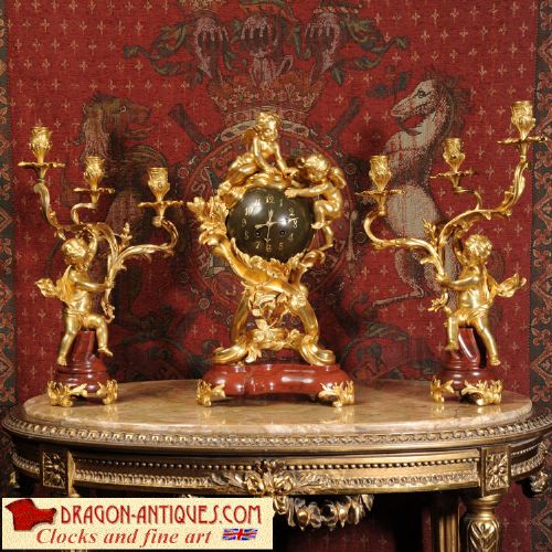 Exceptional Antique French Ormolu and Red Marble Clock Set - Cherubs
by Charles Hour of Paris
