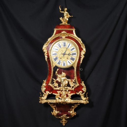 fig 2. Fine Rococo Ormolu and Red Veneer Bracket Clock
With Original Bracket