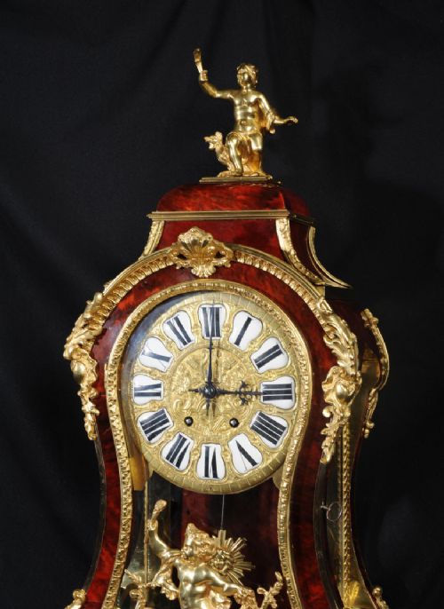 fig 4. Fine Rococo Ormolu and Red Veneer Bracket Clock
With Original Bracket