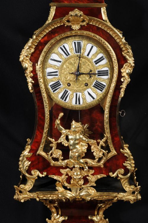 fig 5. Fine Rococo Ormolu and Red Veneer Bracket Clock
With Original Bracket