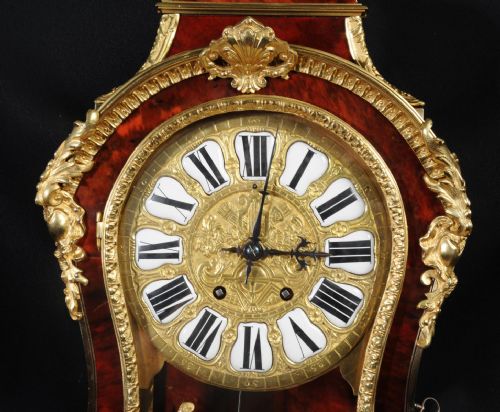 fig 6. Fine Rococo Ormolu and Red Veneer Bracket Clock
With Original Bracket