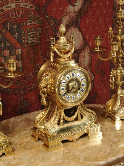 fig 5. Magnificent Gilt Bronze Drum Head Clock Set by Henry Marc, Paris