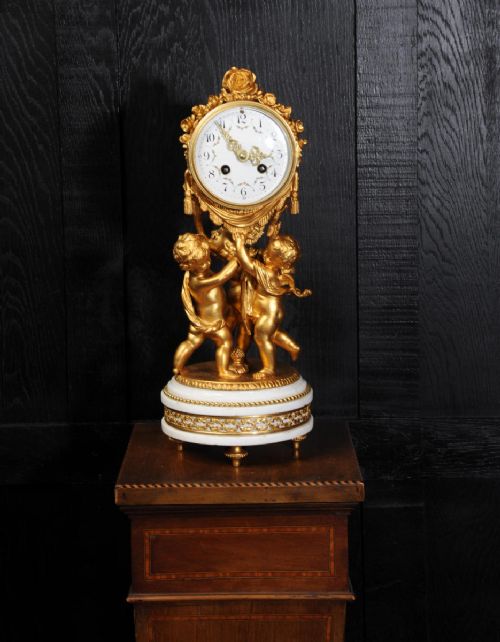 fig 1. Superb Antique French Cherub Clock by Vincenti - visible pendulum
