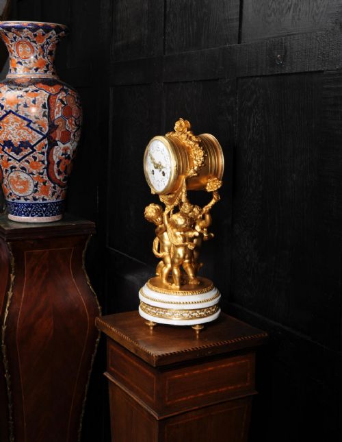 fig 4. Superb Antique French Cherub Clock by Vincenti - visible pendulum