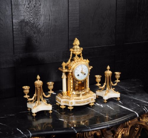 fig 4. Ormolu and Marble Clock Set by Samuel Marti