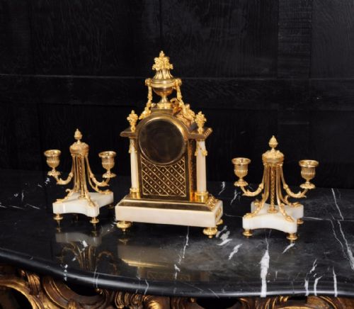 fig 5. Ormolu and Marble Clock Set by Samuel Marti