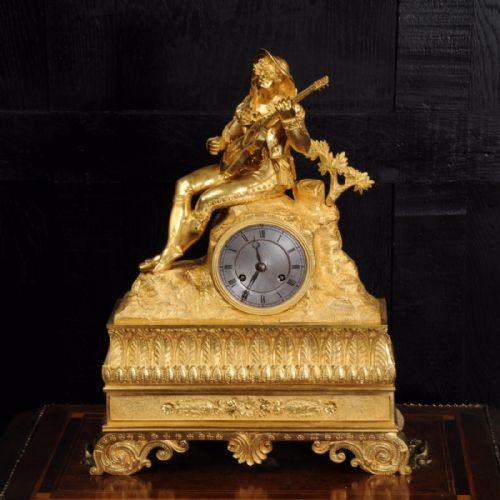 fig 2. Early Ormolu Clock ~ Cavalier Playing a Guitar