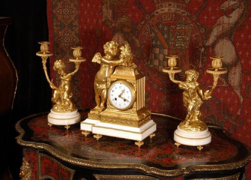 fig 4. Fine Ormolu and White Marble Clock Set by Vincenti