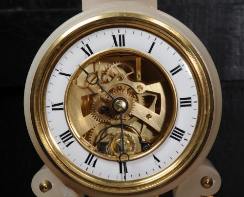 fig 2. Rare Cherub On A Swing Antique French Boudoir Clock with visible escapement