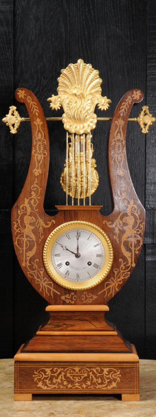 
Rosewood Marquetry and Ormolu Lyre Clock with Mystery Pendulum - Henri Marc