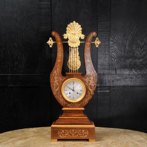 fig 1.
Rosewood Marquetry and Ormolu Lyre Clock with Mystery Pendulum - Henri Marc