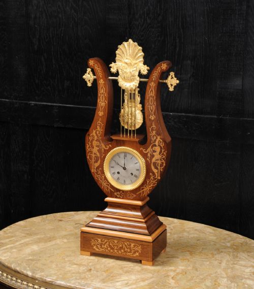 fig 2.
Rosewood Marquetry and Ormolu Lyre Clock with Mystery Pendulum - Henri Marc