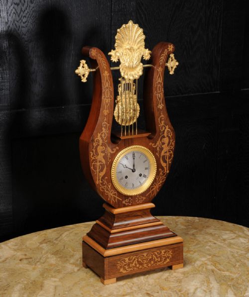 fig 3.
Rosewood Marquetry and Ormolu Lyre Clock with Mystery Pendulum - Henri Marc
