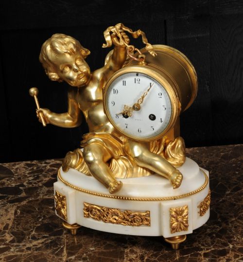 fig 2. Ormolu and White Marble Clock ~ Putto Floating in Clouds Playing a Drum Antique French