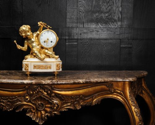 fig 4. Ormolu and White Marble Clock ~ Putto Floating in Clouds Playing a Drum Antique French
