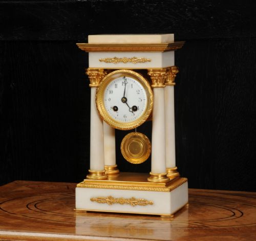 fig 2. Antique French Ormolu and White Marble Portico Clock