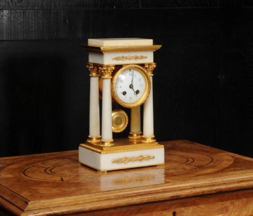 fig 3. Antique French Ormolu and White Marble Portico Clock