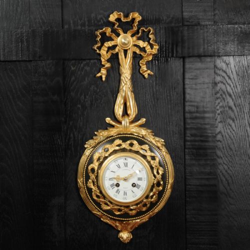 fig 1. Louis XVI Ormolu and Bronze Cartel Wall Clock