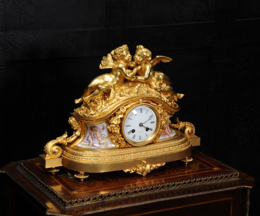 Fine and Early Ormolu and Porcelain Clock ~ Cherubs