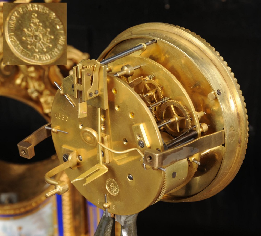 A Louis XVI style French ormolu and cobalt blue hand-painted porcelain mantel clock topped with an urn finial. View XIII