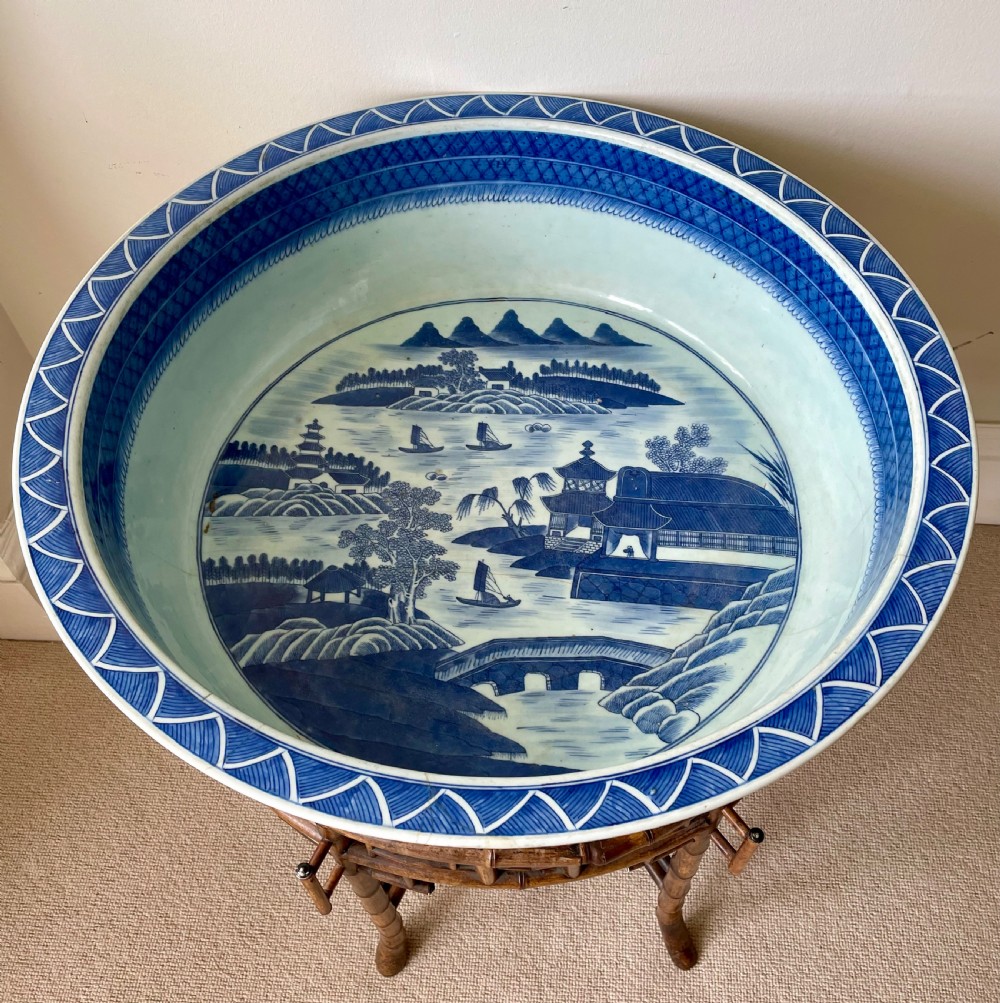 A large 19th c. Chinese blue and white bowl with bamboo stand. View II