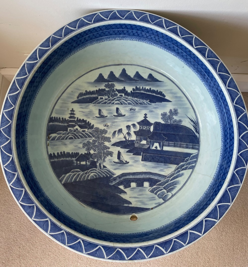 A large 19th c. Chinese blue and white bowl with bamboo stand. View IV