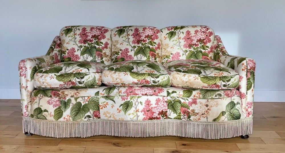 An Edwardian chintz covered sofa