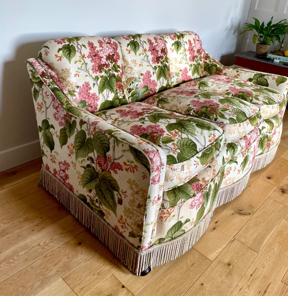 An Edwardian chintz covered sofa View III