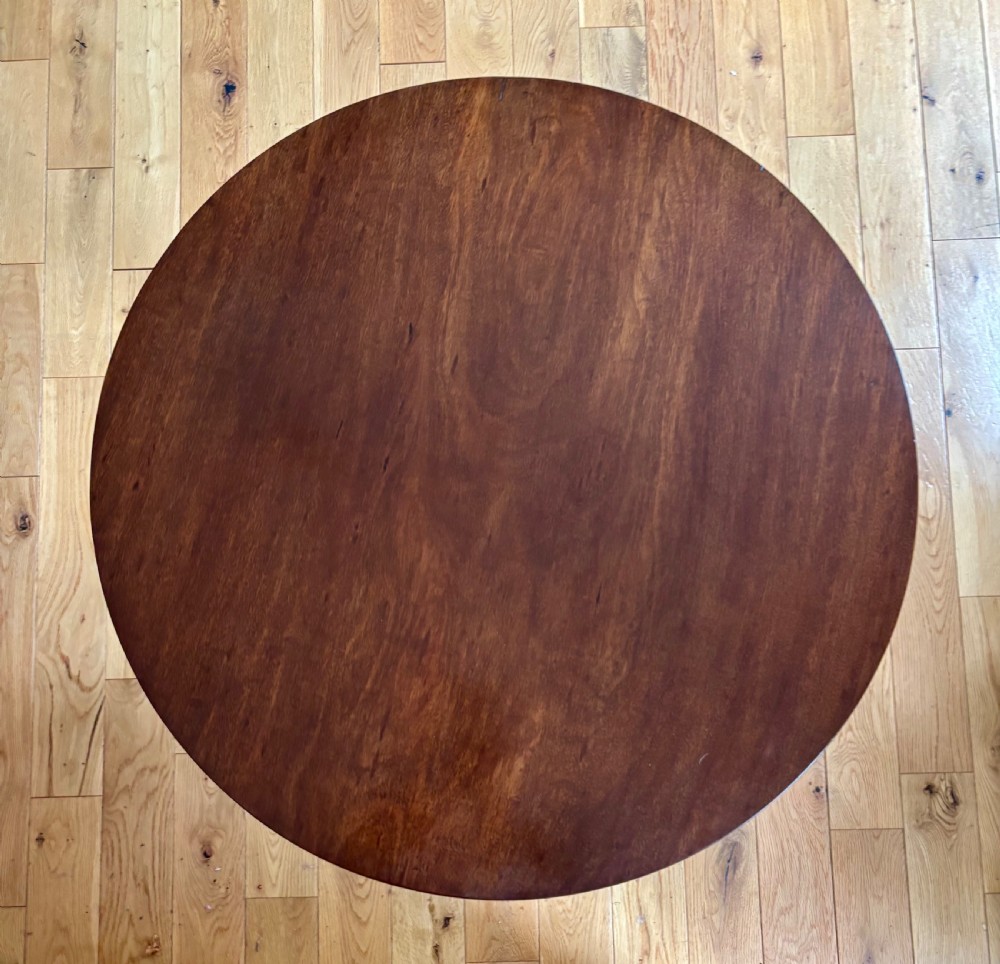 A circular Scottish George II mahogany occasional table featuring a single-piece turned pedestal column set on three cabriole legs with pad feet. View VII