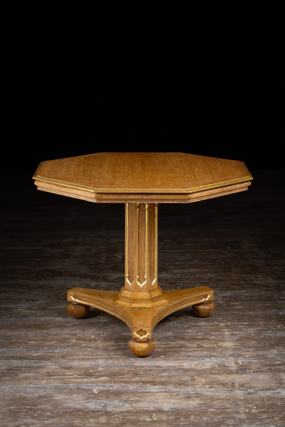 An early Victorian oak gothic centre table