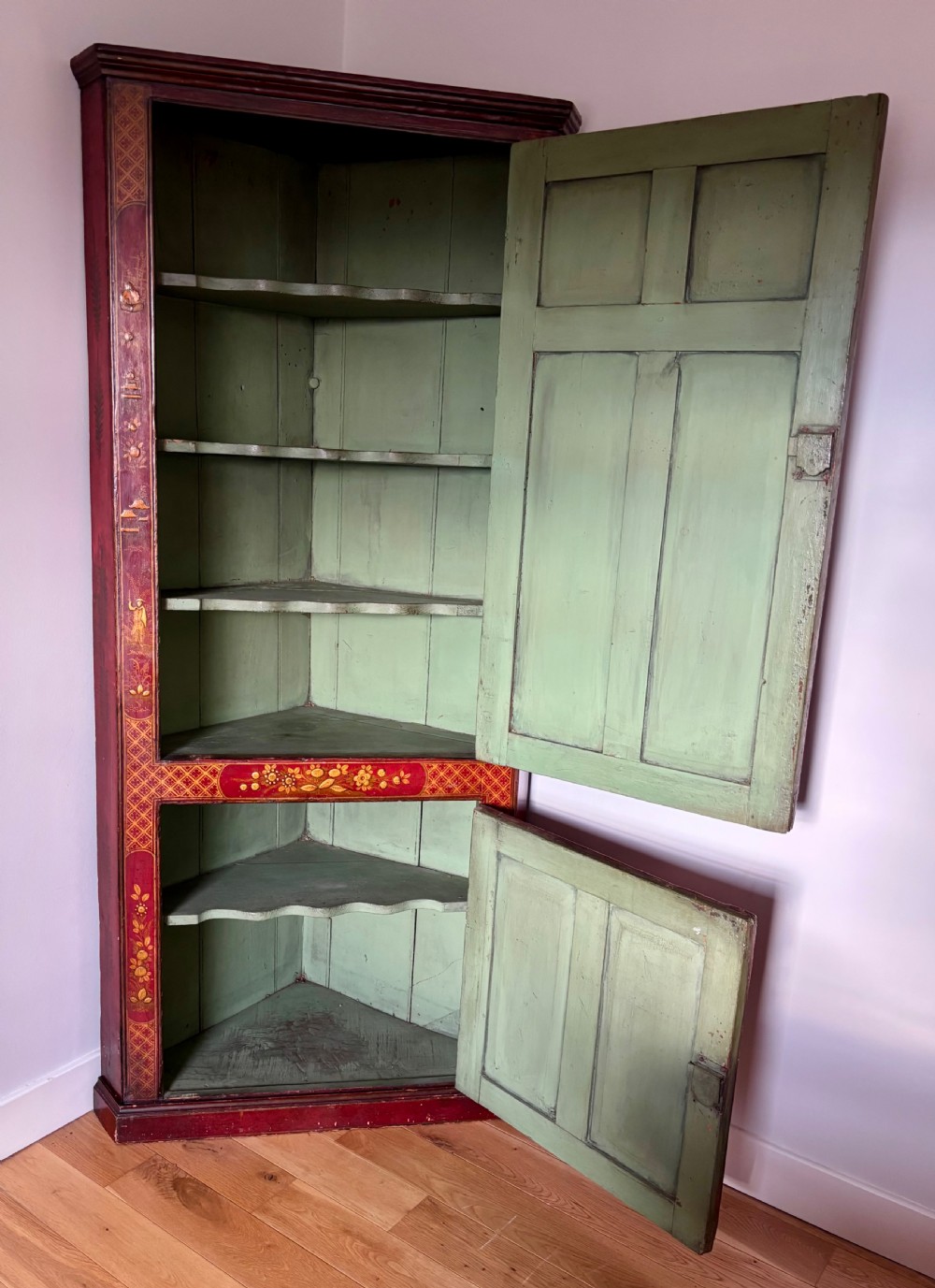 A George III red lacquer cabinet View II