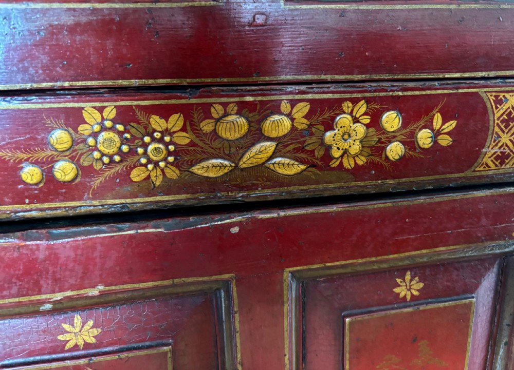 A George III red lacquer cabinet View V