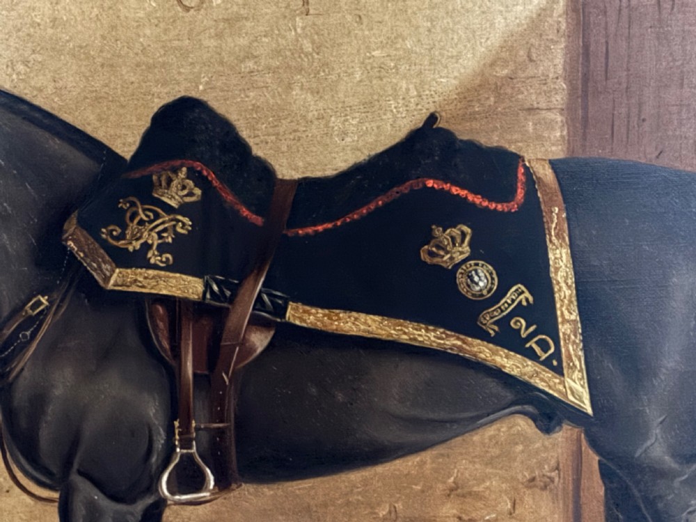 A late Victorian equestrian oil painting depicting a dark horse titled Balmoral in a stable setting, presented within a wide oak frame with a gilt inner slip. View III