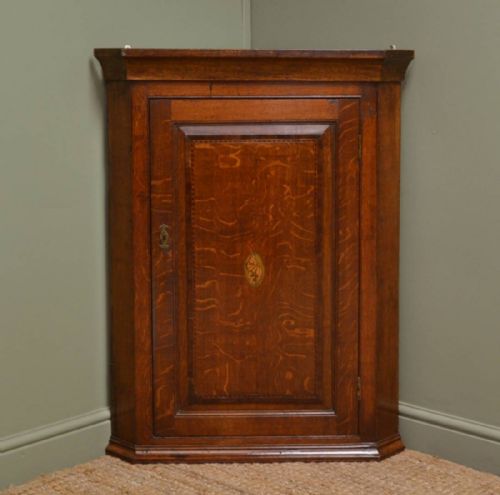 George III Oak Antique Corner Cupboard with Shell Inlay.