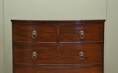 fig 2. Fine Regency Mahogany Antique Bow Fronted Chest of Drawers with Lion Head Handles.