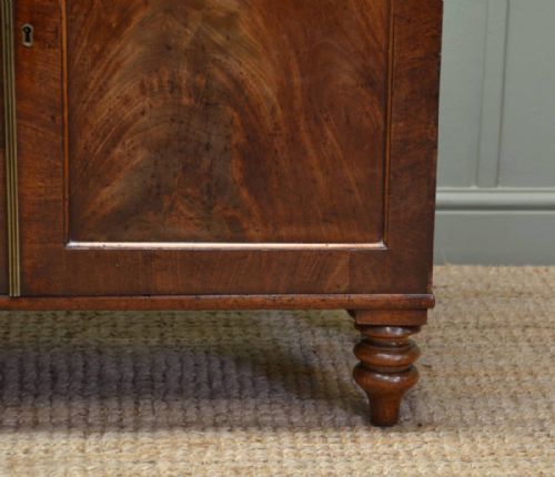 fig 1. Figured Mahogany Antique Regency Cupboard