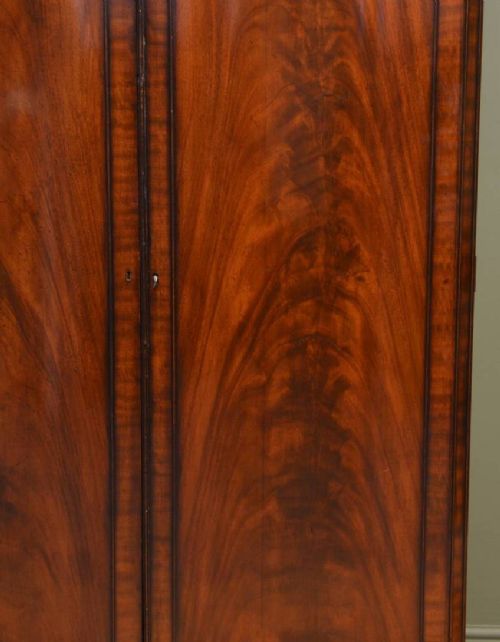 fig 1. Figured Mahogany Serpentine Shaped Edwardian Antique Double Wardrobe