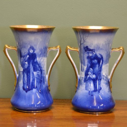 A Pair of Royal Doulton 'Blue Children' Vases