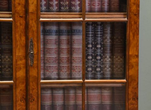 fig 2. Beautifully figured Golden Burr Walnut Edwardian Glazed bookcase