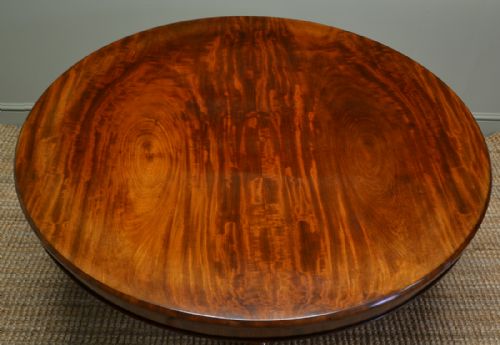 fig 1. Beautifully Figured Circular Mahogany Antique Dining Table.