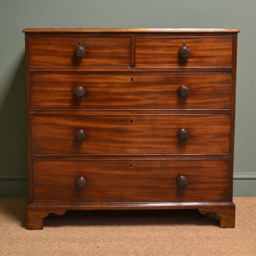 Regency Mahogany Antique Chest of Drawers with Decorative Carved Handles.