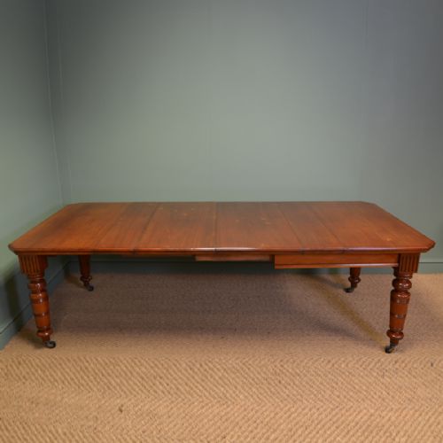 
Large Victorian Walnut Antique Extending Dining Table
