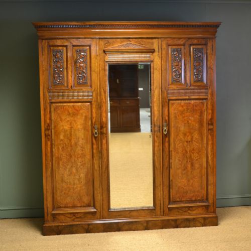 Striking Victorian Figured Burr Walnut Antique Triple Wardrobe by Philips & Jones
